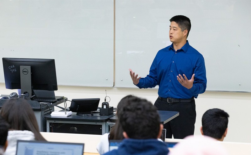 Binghamton University Assistant Professor Jason Xiao teaches an accounting course in October 2023.