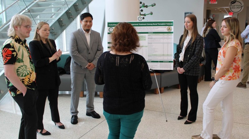 From left to right, P4 students James Thurston, Abigayle Carpenter, Manuel Sucuzhanay, Amanda Northup and Calixta Terrell, share their capstone research project.