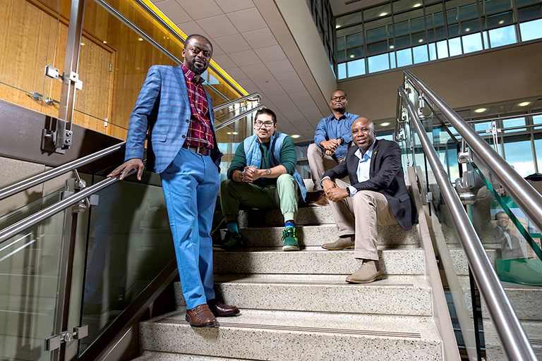 Community Research and Action doctoral students, (from left) Frank Okyere Osei, Adam Zhao, Paul Macharia and Jerome Nenger.