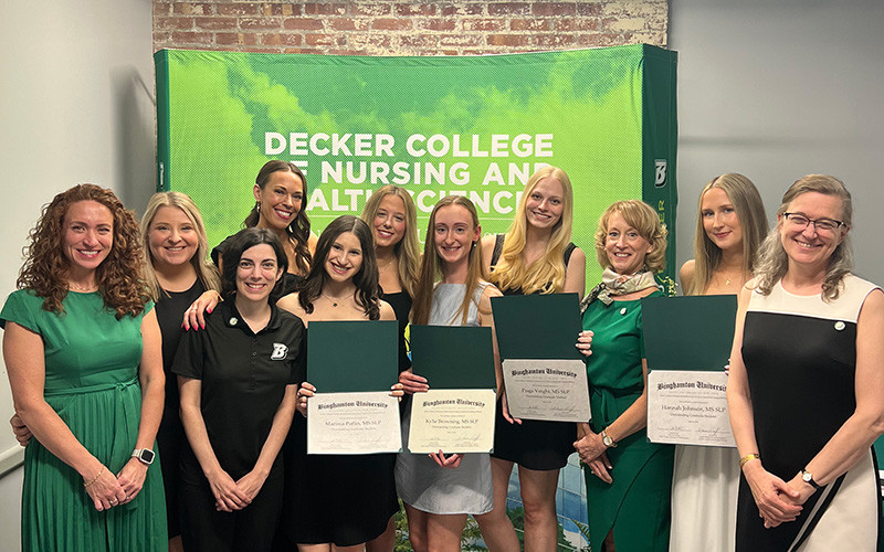 Decker students, family members, faculty, and staff all enjoyed making memories in front of the Binghamton backdrop before and after the awards ceremony. Here are students and faculty from the Division of Speech and Language Pathology.