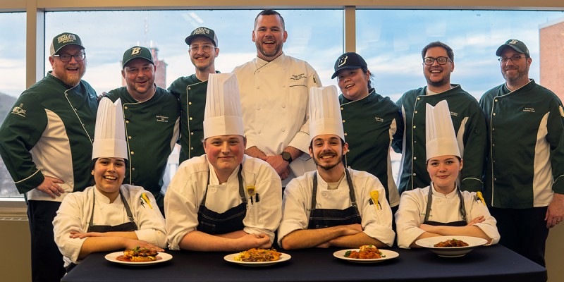 Culinary Institute of America externs Jacqueline Delgado, Evan Malik, Phil Williams and Jade Lopez competed in a Culinary Battle of the Externs competition on March 27 in Appalachian Dining Hall.
