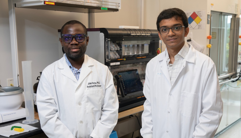 Assistant Professor of Pharmaceutical Sciences John Fetse, second-year PharmD student Smit Patel