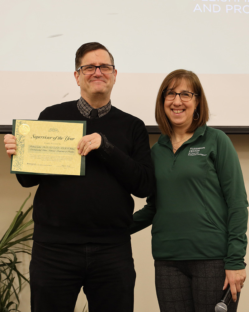 Professor Rodney Gabel, Division of Speech and Language Pathology, was named Supervisor of the Year. Kathie Boice from the Fleishman Center presented his award.