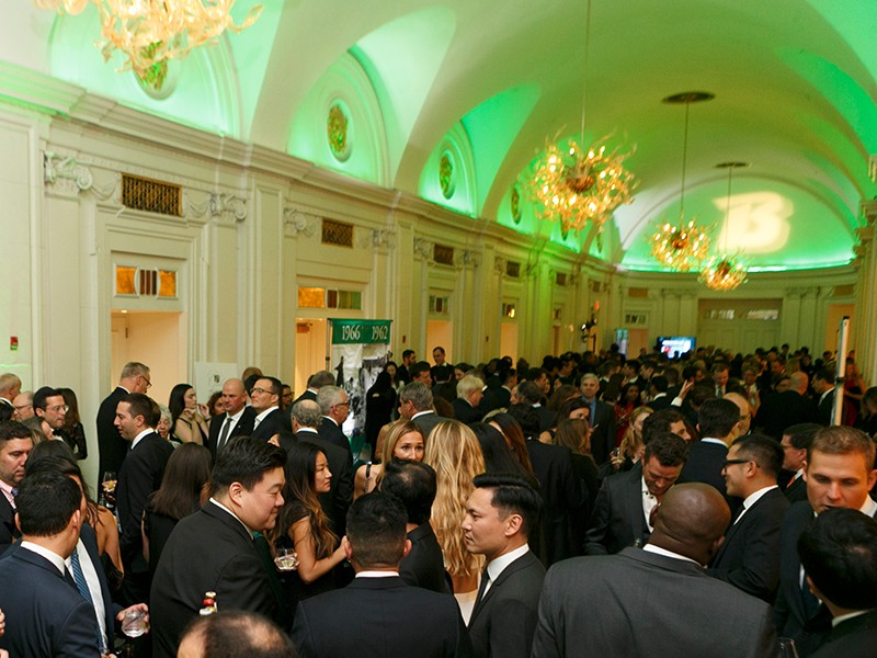 Guests visit and network with one another during a cocktail reception.