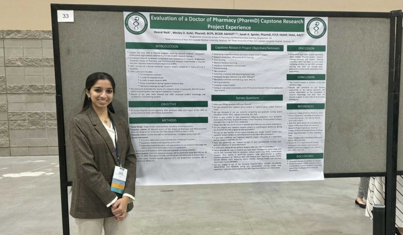 Third-year PharmD Student Heeral Naik with her research poster at the 2024 ACCP Annual Meeting.