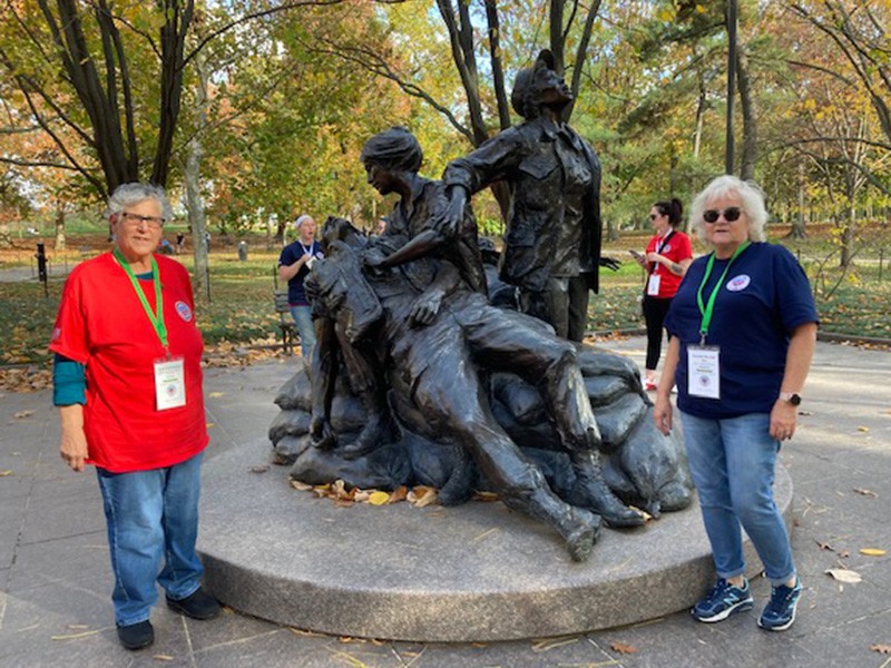 Laura Terriquez-Kasey, left, and Suzanne Williams, far right, visited the Vietnam Women's Memorial, which is dedicated to the nurses and women from the United States who served in the Vietnam War.