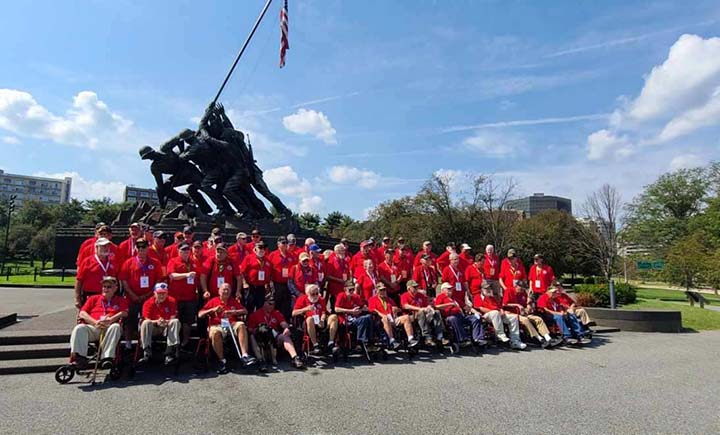 Veterans from Twin Tiers Honor Flight Mission 10 (the 10th trip) in front of the United States Marine Corps War Memorial. Since 2014, the group has taken more than 500 veterans to see the war memorials in Washington, D.C.