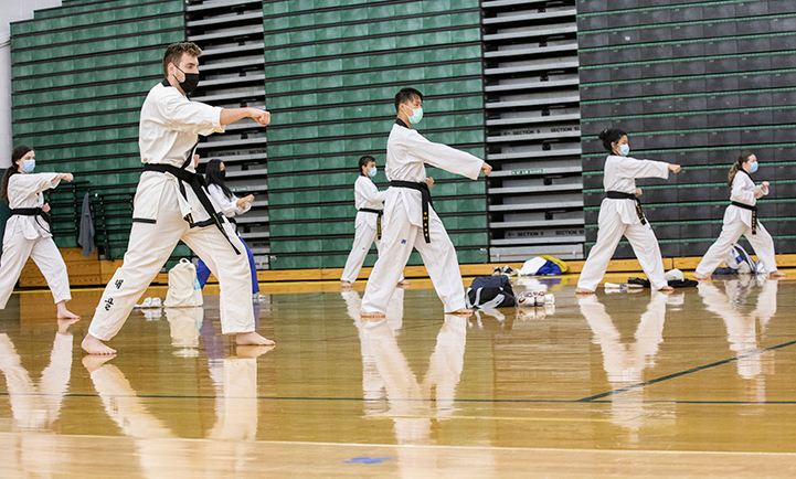John Fletcher, whose taekwondo classes were held in person in fall 2020, admitted that it's difficult to work out in a mask. “But I was so impressed with the students who kept showing up to class,