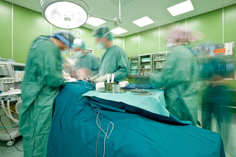 Stock photo of physicians during surgery.