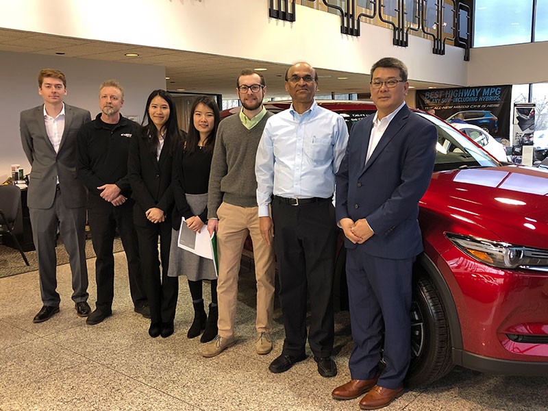 School of Management faculty and students visit a Mazda dealership.