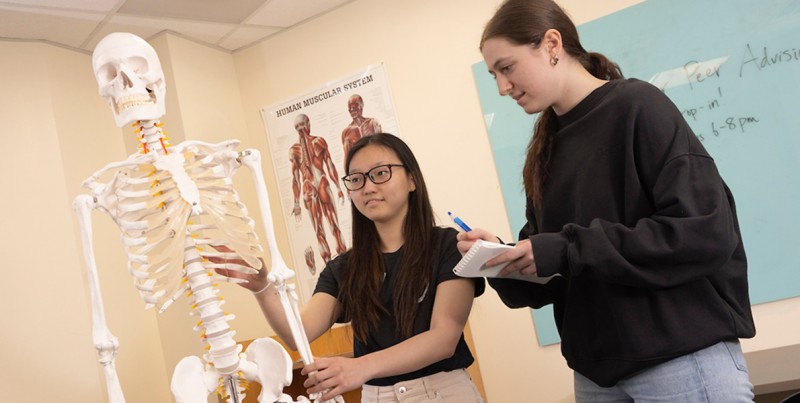 Decker College peer advisor Huilin (Kelly) Li, left, and Residential Life community assistant Lindsey Sheeley in the Nursing Learning Community Study Lounge.
