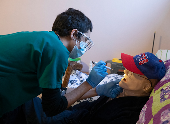Senior nursing students in Decker's Practice of Nursing IV class took on a new challenge this year: a home care simulation in a real house.