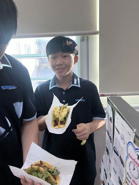 Taco Tuesday: Students enjoy their first tacos as part of Piacente's lesson plan.