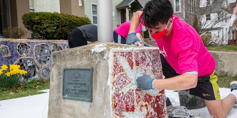 PwC Scholars install a mosaic at the American Civic Association in Binghamton