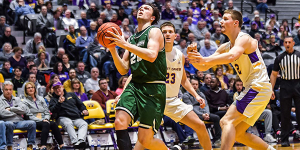 America East Rookie of the Year in 2020, George Tinsley goes for a basket during a home game played last season against the University at Albany.