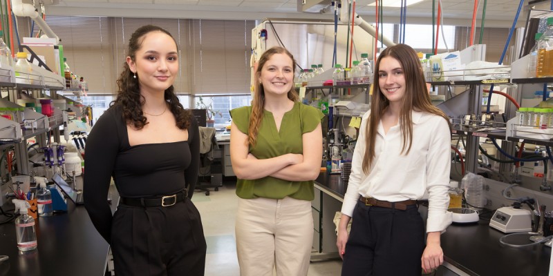 A team of undergraduate researchers hopes to help millions of women worldwide suffering from recurrent urinary tract infections. Left to right, Rachel Proper, Katherine Peters and Sydney Nierstedt.