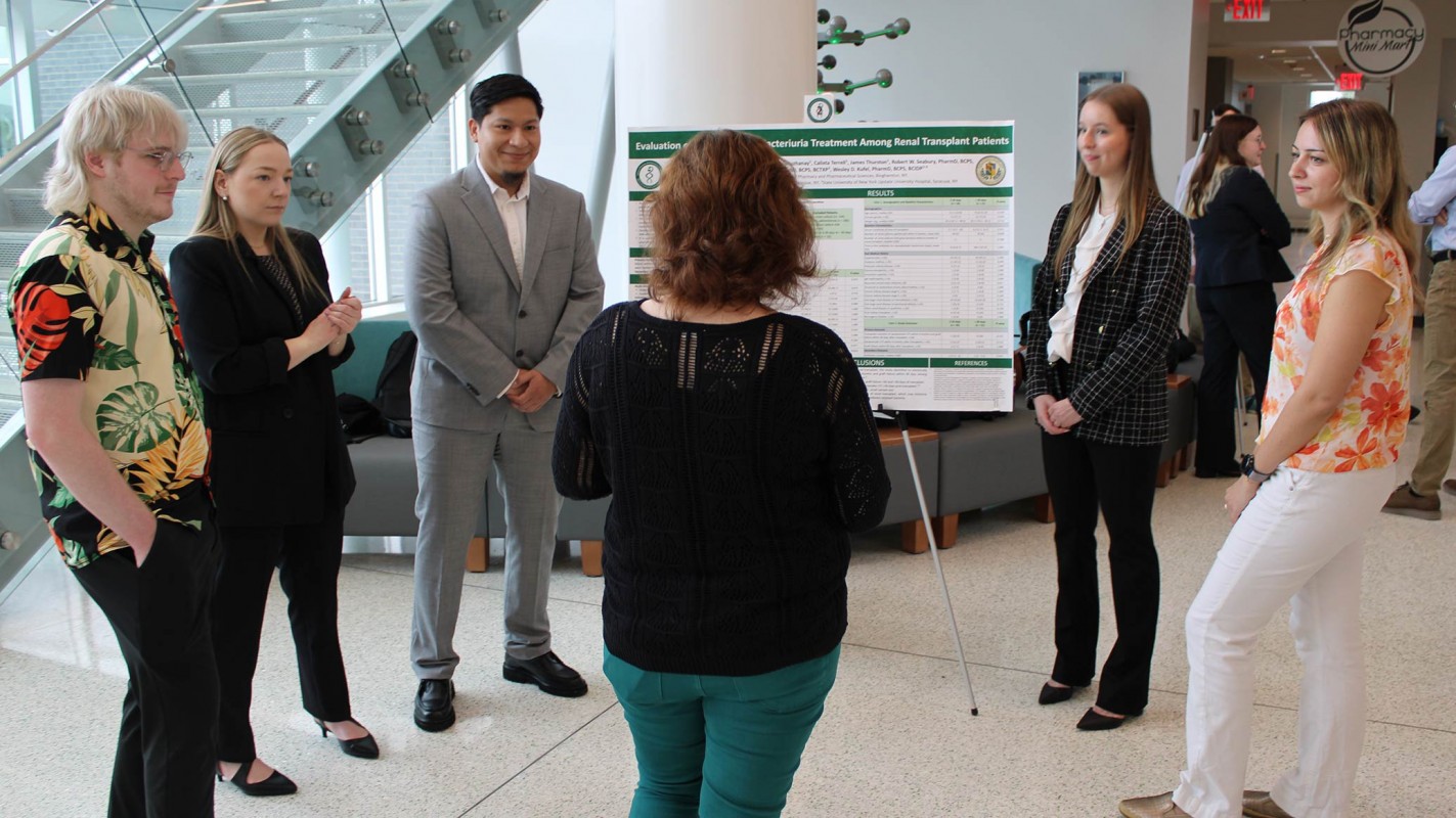 From left to right, P4 students James Thurston, Abigayle Carpenter, Manuel Sucuzhanay, Amanda Northup and Calixta Terrell, share their capstone research project.