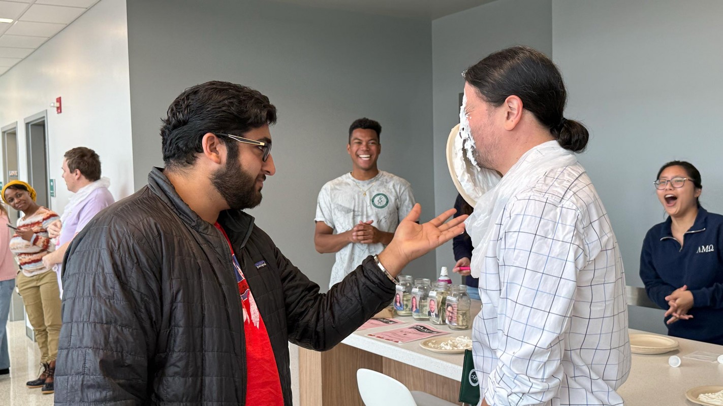 Second-year pharmacy student Rohit Kundlas made sure not to miss when it was his turn to pie Clinical Assistant Professor of Pharmacy Practice Anthony Hopkins.