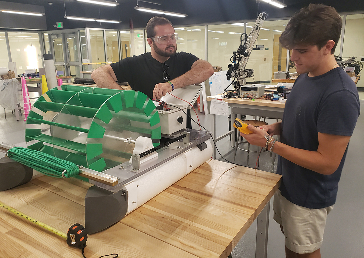 Thomas Eaton ’22, left, and Liam Vallejo ’22 work on their senior project at the Fabrication Lab in the Engineering Building.