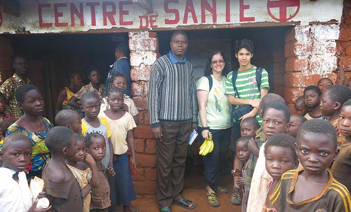 Annette Bongiovanni, center, works with her son Pace Bongiovanni, right, in the Democratic Republic of Congo. They were part of a large household and health facility survey conducted across four provinces of the DRC.