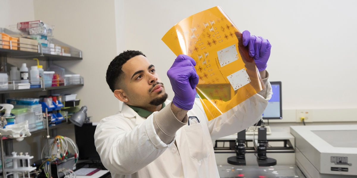 Watson College undergraduate Bryan Cabrera has taken on manufacturing internships and research co-ops, including work with the team from the Center for Advanced Microelectronics Manufacturing.