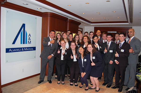 Paul Aversano '93 and Deep Parekh '01 hosted 24 School of Management students involved in the Dean's Mentoring Program at the New York City firm for an employer visit and case competition.