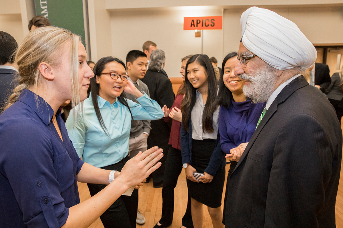 Dhillon with students at the 2016 SOM Spotlight event