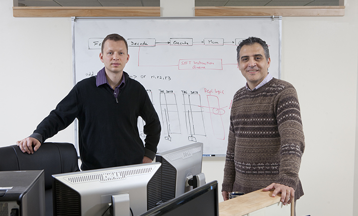 Binghamton University computer science professor Dmitry Ponomarev (left) with former Binghamton University computer science professor Nael Abu-Ghazaleh (right) who is now working at University of California, Riverside.