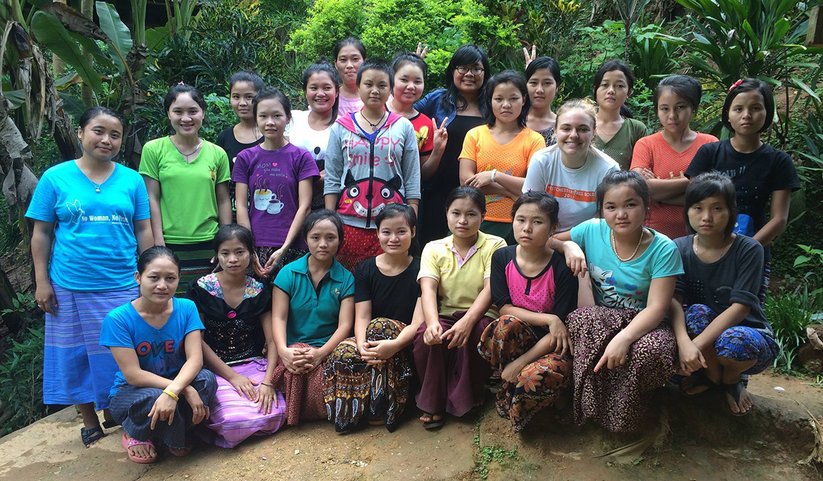 As part of Project KARE, Haythi Ei (back row, glasses) taught English as a Second Language at the Mae Ra Moe refugee camp when she was 17 years old. The camp is located on the Thailand-Myanmar border.