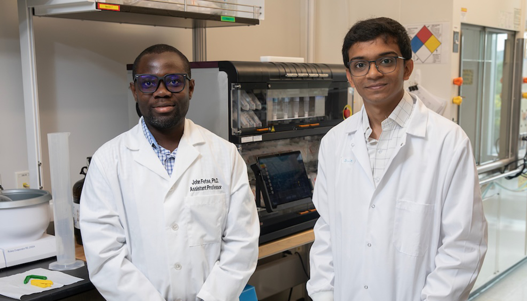 Assistant Professor of Pharmaceutical Sciences John Fetse, second-year PharmD student Smit Patel