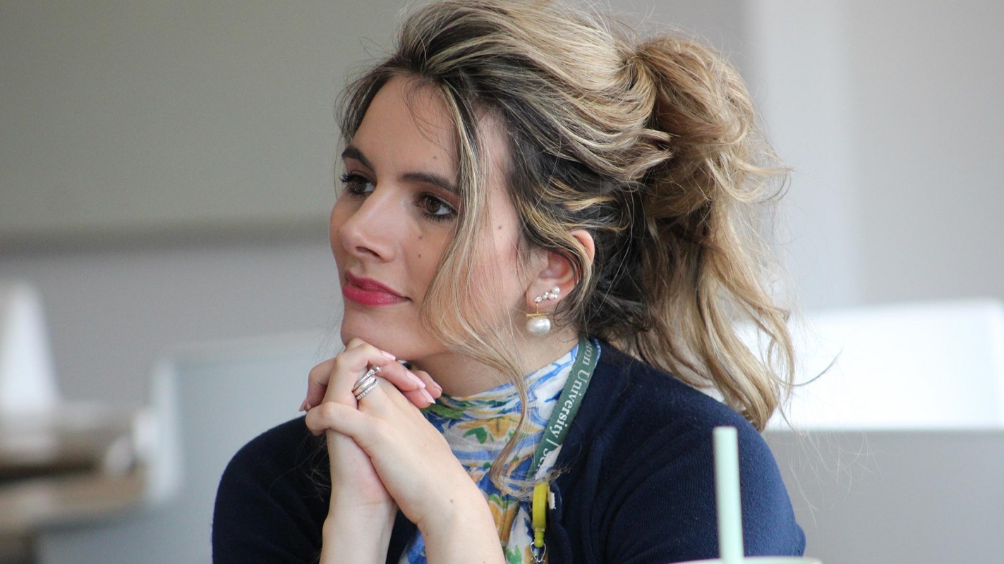 Keri A. Dwyer, PharmD '21, a clinical assistant professor of pharmacy practice, listens during Brooke L. Griffin's presentation.