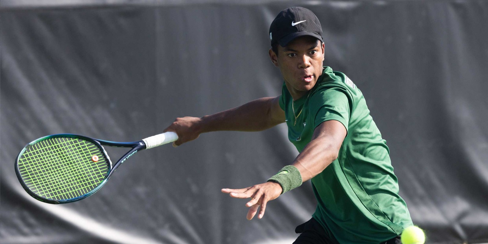 P2 student Kyle Weekes during a match for the Binghamton University Men's Tennis Team