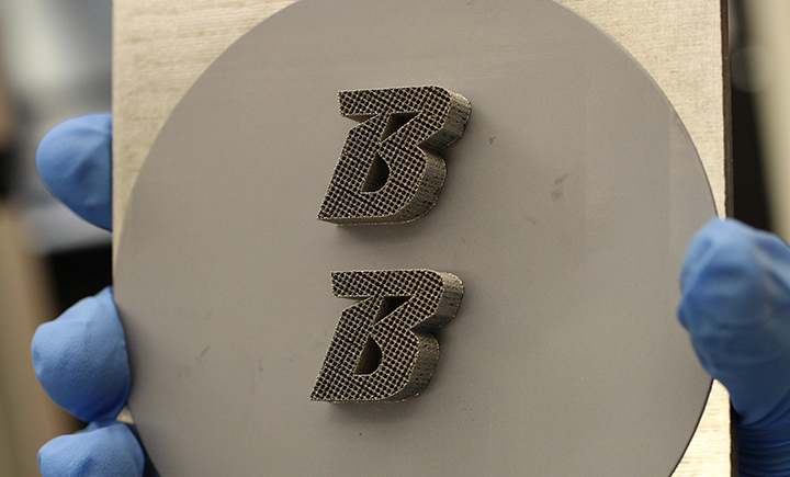 One way that the researchers tested their technique was by printing the Binghamton University logo onto silicon with the 3D metal laser printer.