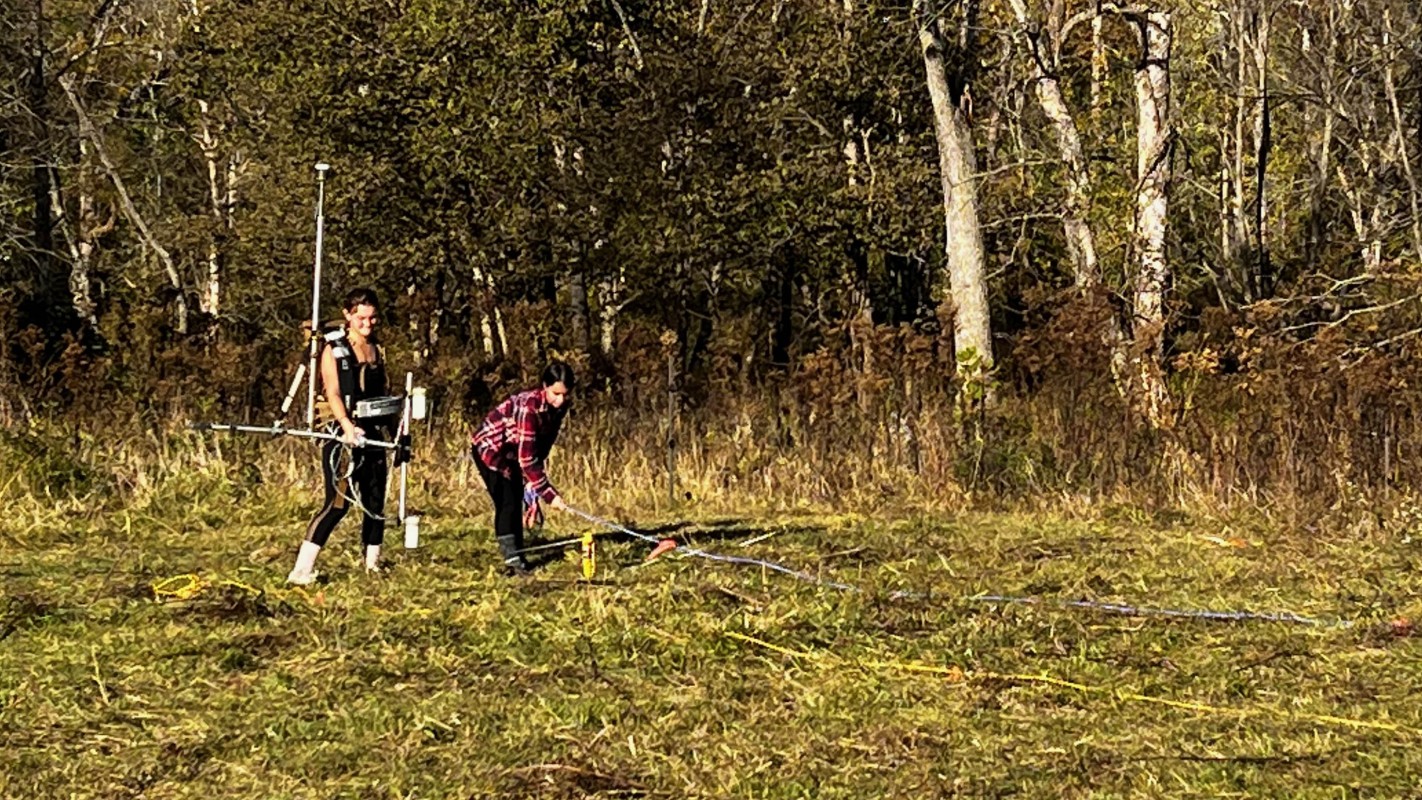 Environmental studies major Jalissa Pirro (right) and geological sciences major Madison Tuohy (left) doing fieldwork at an archaeological site.