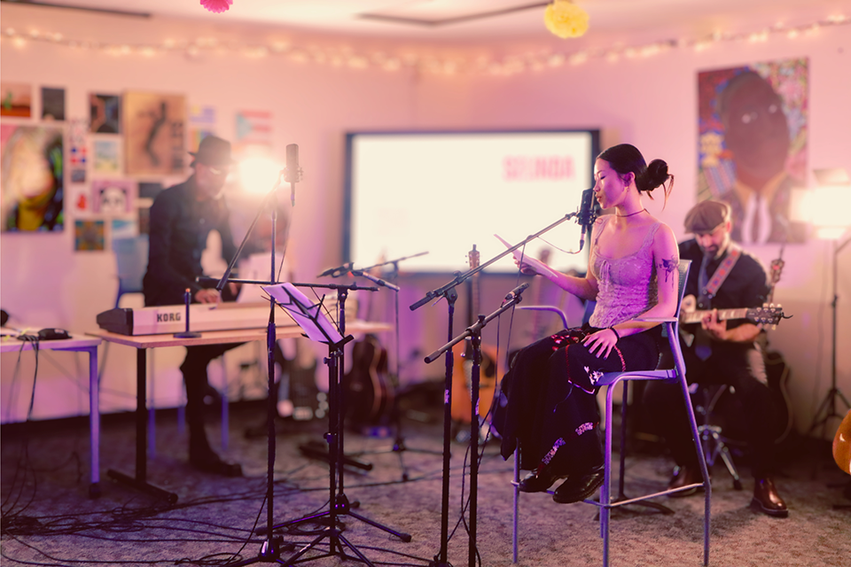 Poet Selinda Lawren performed three original works.