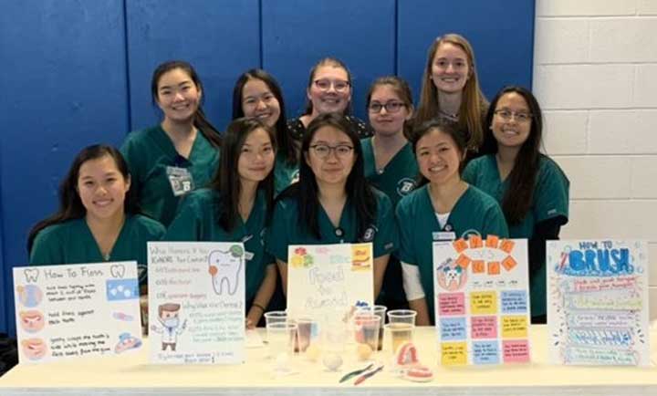 Among the key skills nursing students must master is how to educate patients. To practice those skills, Decker nursing students created educational projects on a number of topics and presented them to children. Here, they're engaging children with activities about dental health