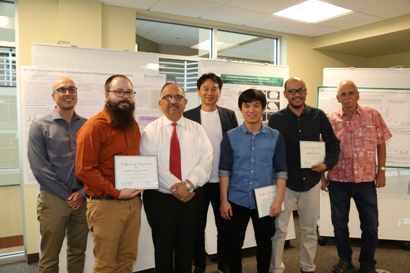 Winners of the poster competition at the recent Electronics Packaging Symposium – Small Systems Integration are, from left, Professor Manuel Smeu (faculty advisor for first place), Michael Woodcox (first place winner) Dean Krishnaswami 