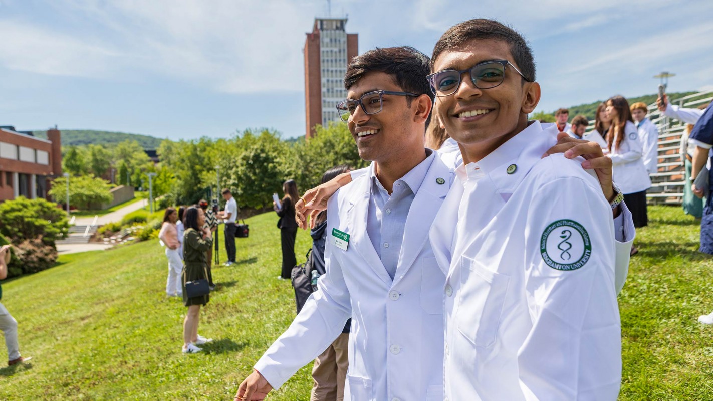 P1 students Dev and Smit Patel are all smiles following the 2025 White Coat Ceremony.