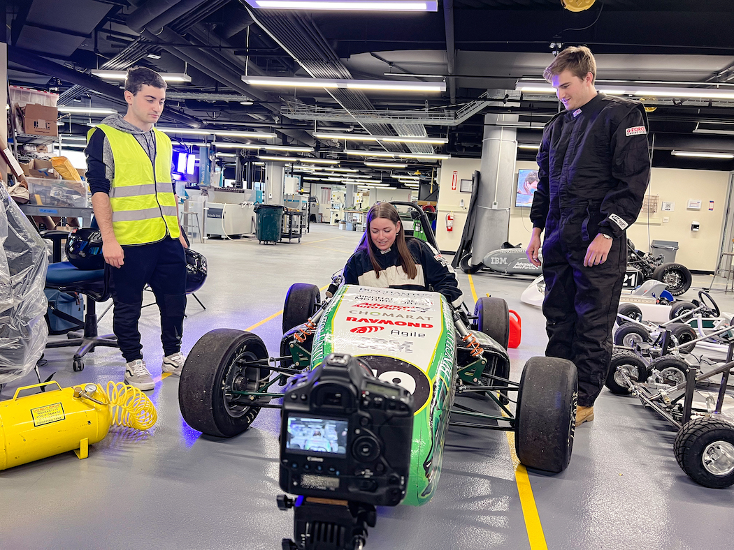 Chloe Van Caeseele films a scene for the tour exploring the many labs on campus.
