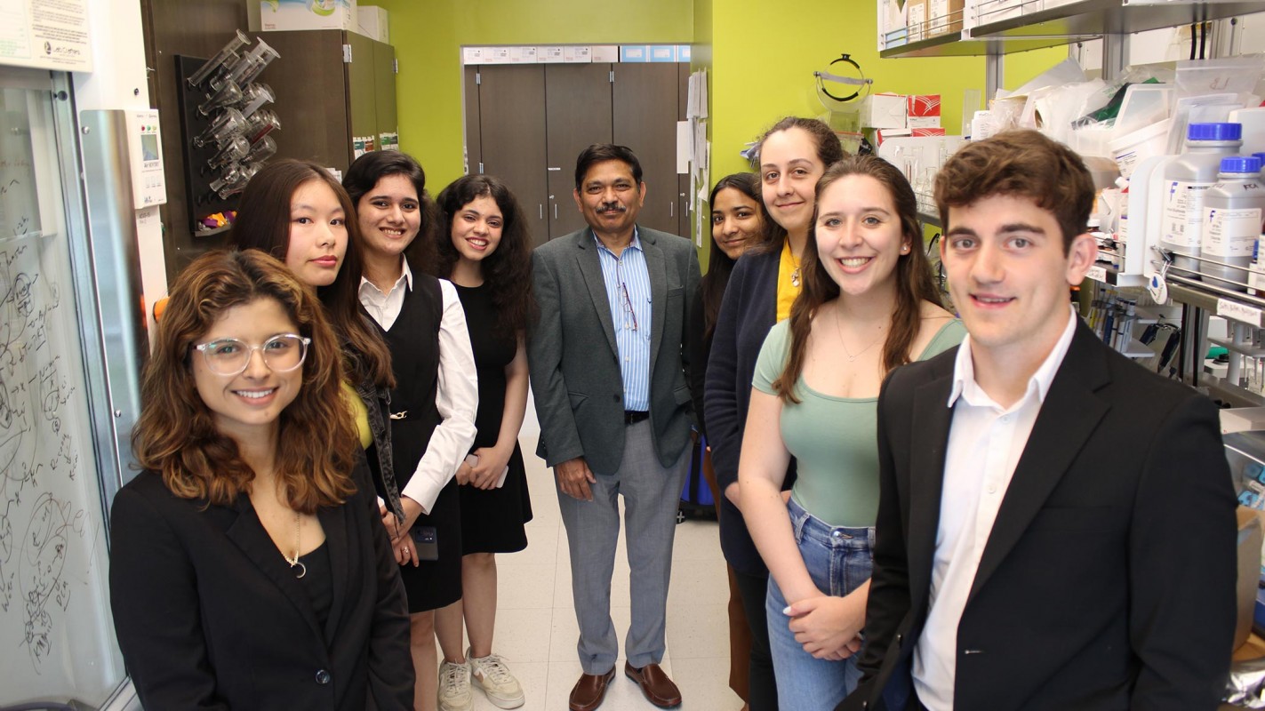 Pharmacy and undergraduate students stand with Dean and SUNY Distinguished Professor Kanneboyina Nagaraju ahead of their summer internship at the School of Pharmacy.