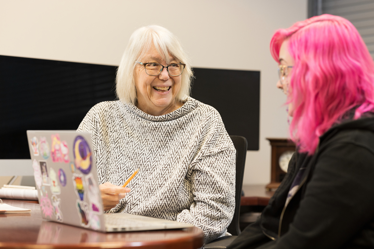 Deborah Taub, professor and chair of the Higher Education and Student Affairs program, meets with Gwen Cotten '23, a graduate student and alumna.