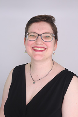 A human female smiling