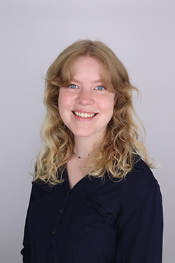 A human female smiling