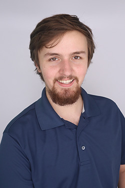 A human male smiling