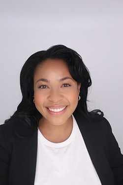 A human female smiling