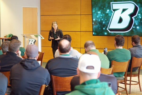 President Anne D'Alleva meets with staff from the Athletics Department