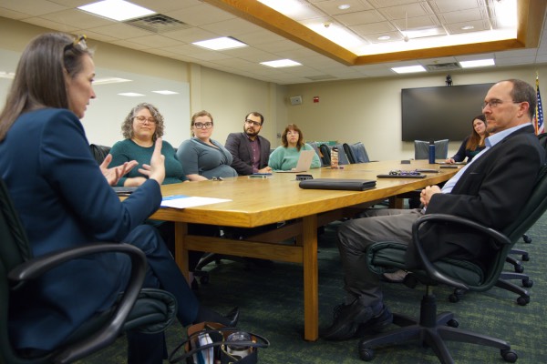 President Anne D'Alleva meets with faculty and staff from the Graduate School