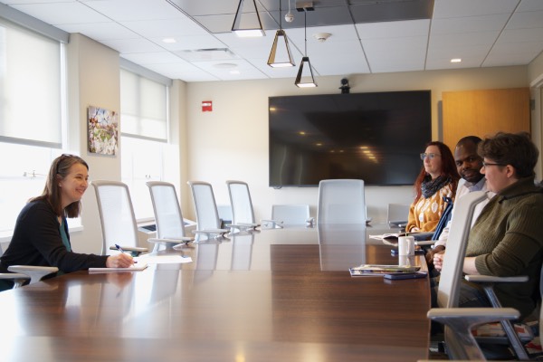 President Anne D'Alleva meets with leaders from the Graduate Student Organization
