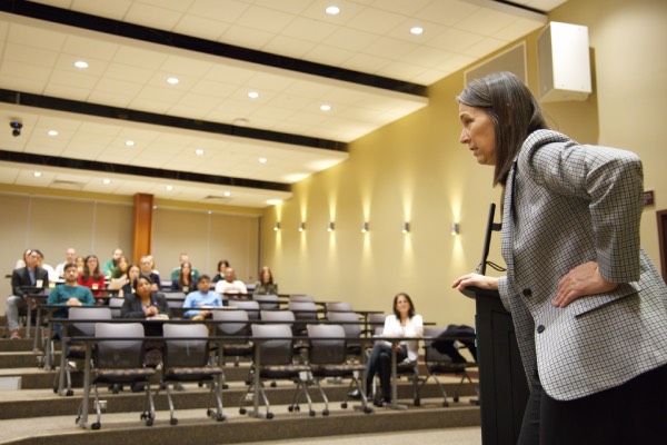 President Anne D'Alleva speaks to faculty and staff from the Divison of Research