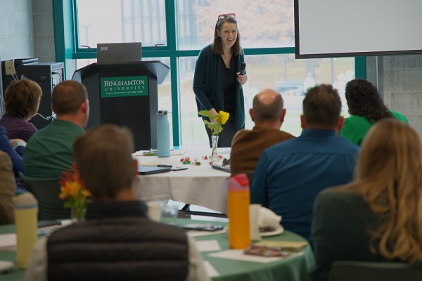 President Anne D'Alleva speaks to members of the Student Affairs Leadership Team